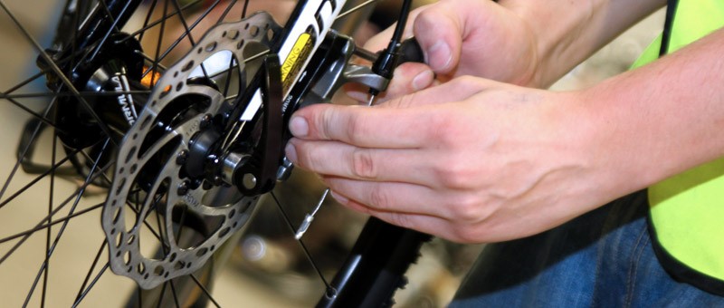 tightening disk brakes on a bike